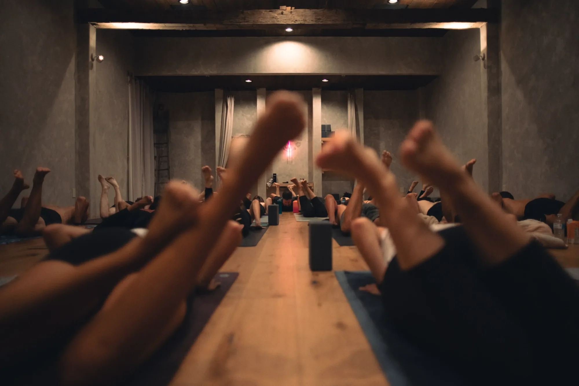 Students resting together during a heated class at REWILD