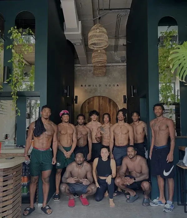 A group gathered in the REWILD studio